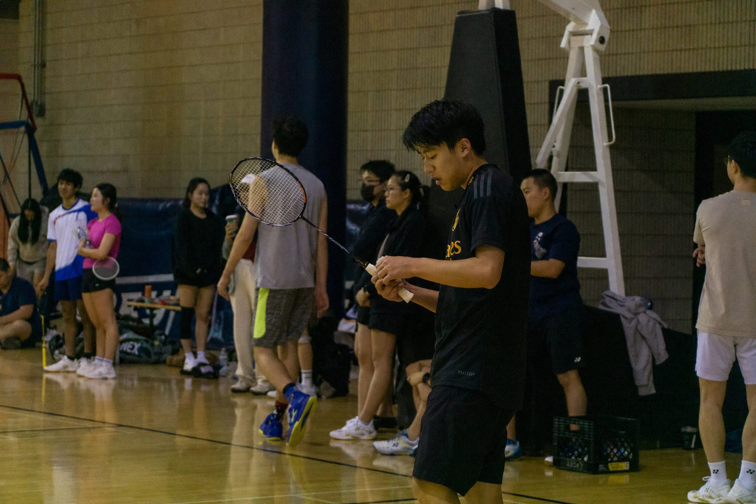 Philip Wang on a badminton court at Emory